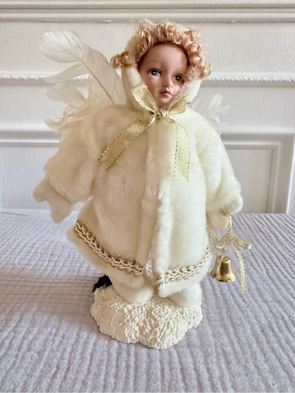 Beautiful vintage Christmas angel figurine featuring a finely crafted porcelain